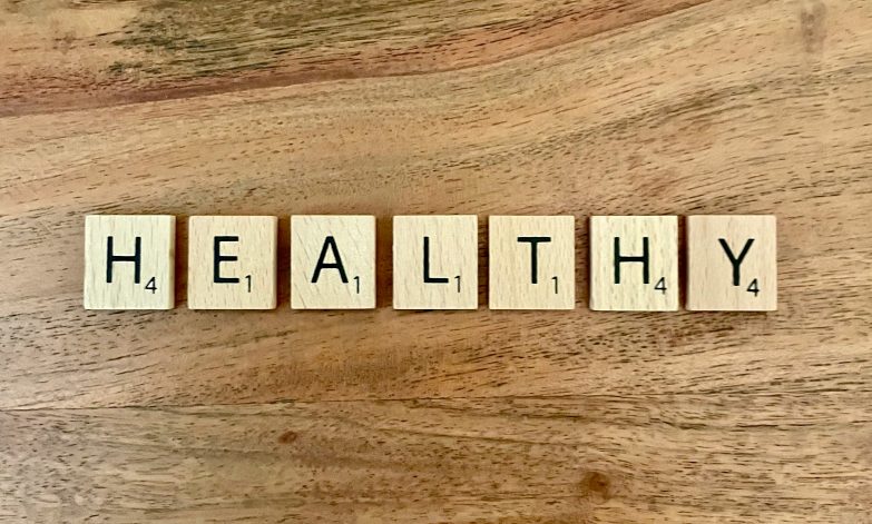 The word "healthy" spelled out in blocks
